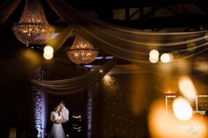 swag crystal chandeliers and beam drapes copyright james white photography